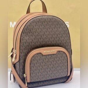 NWT Michael Kors classic leather Logo Backpack. 12”H x 14”H.